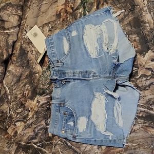 Levi's 501 shorts high rise size 31 and color is a light blue